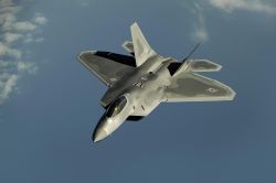 Front overhead view of the F-22 in flight